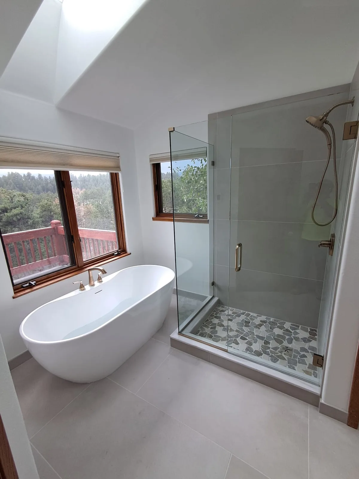 Remodeled bathroom with freestanding tub