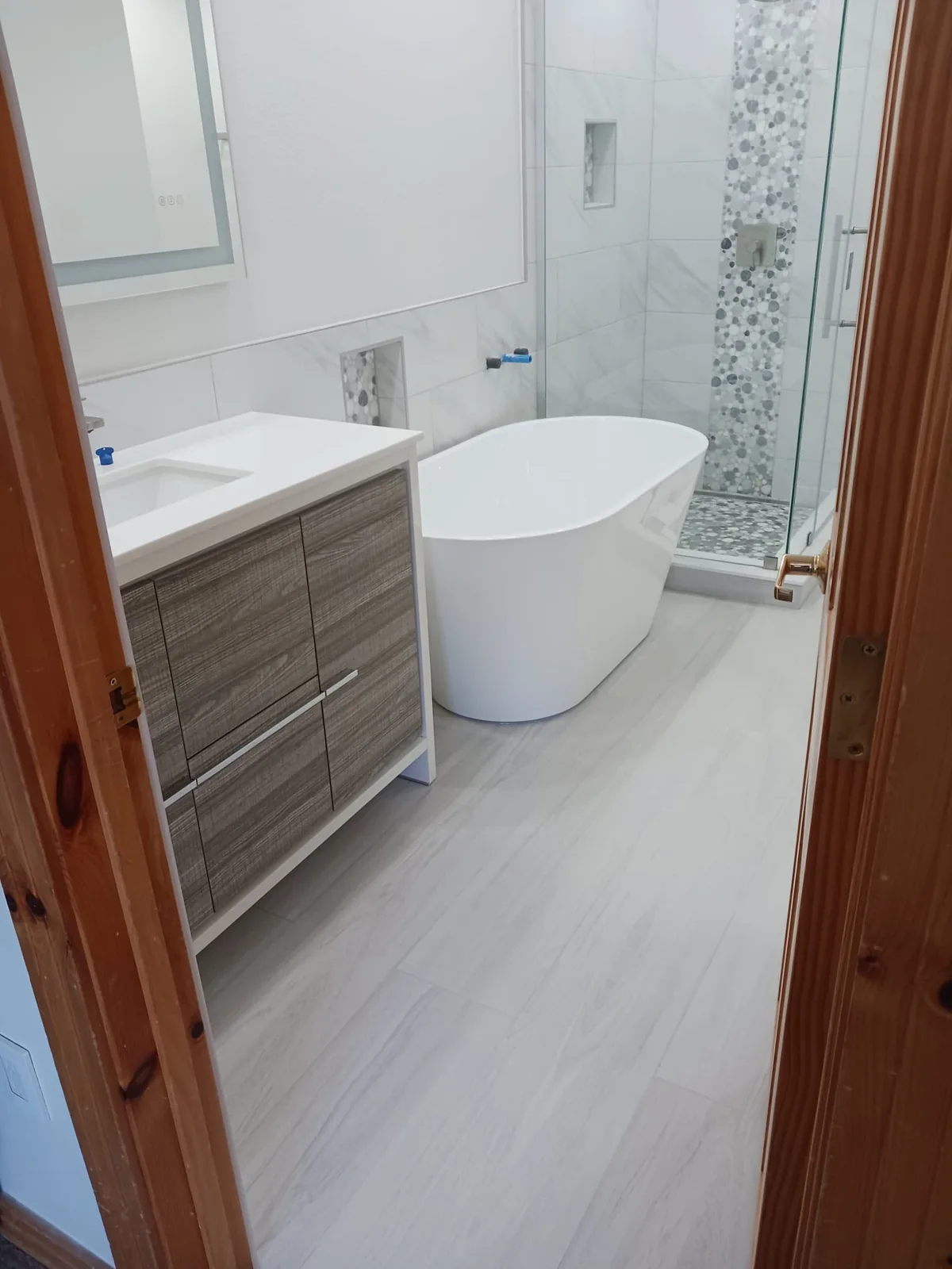 Bathroom remodel with freestanding tub